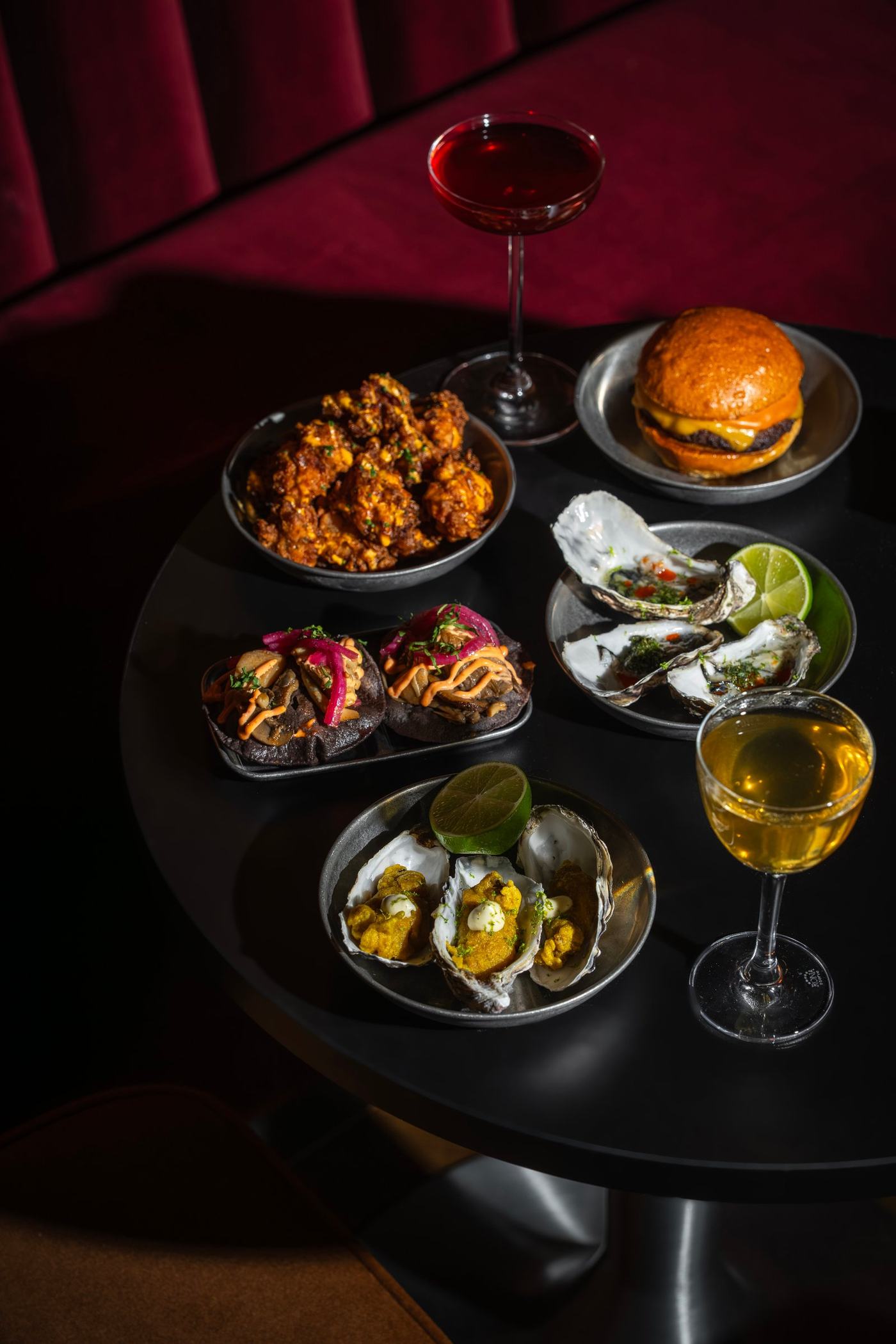 Fried oysters, burgers and popcorn chicken