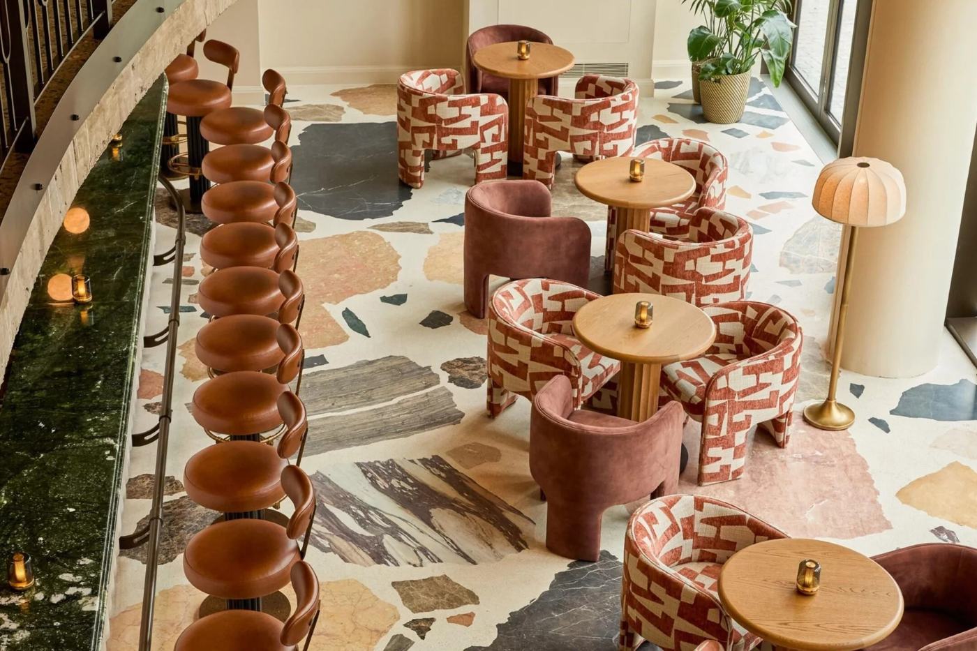 Terrazzo floors in rust, cream, grey and green