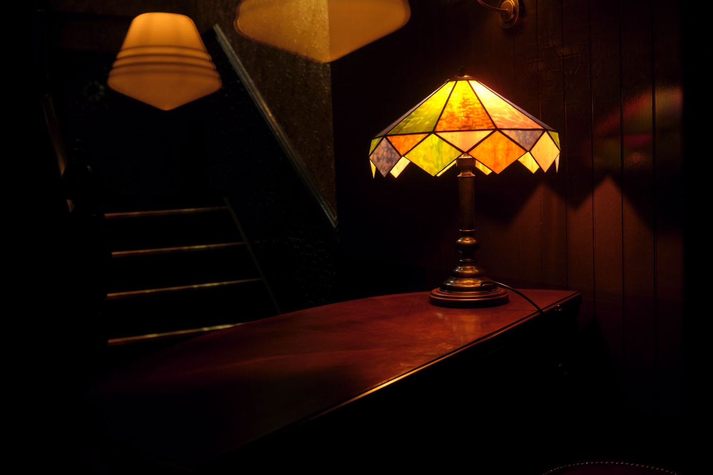 Stained-glass lamp at the head of the stairs to Crisp